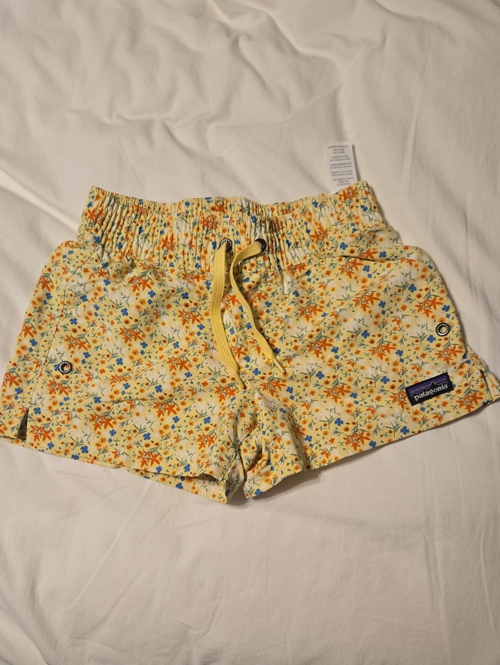 Patagonia Yellow Floral Athletic Shorts Size Small (7/8)